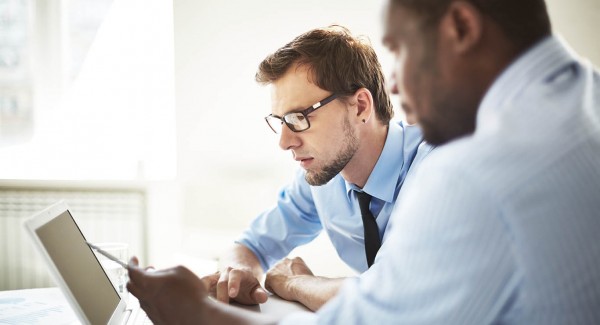 CILT Membership Levels - Two men looking at a laptop together