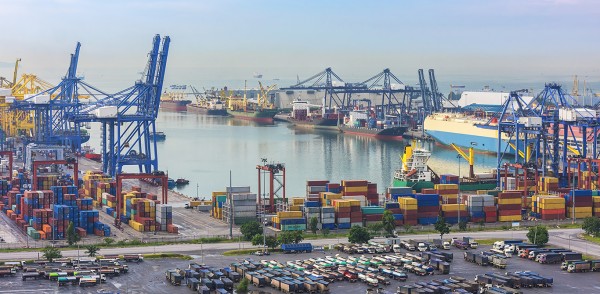 CILT Our role in logistics and transport view of a port with containers, ships and trucks